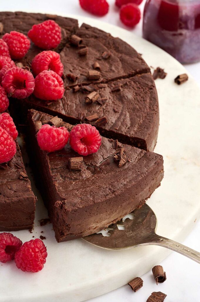 A spatula serving a slice of the chocolate torte recipe.
