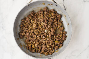 Classic cheeseburger salad with all the fixings &mdash; beef, cheese, tomato, and special sauce.