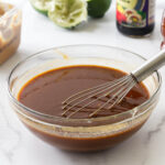 Whisking miso glaze marinade in a dish.