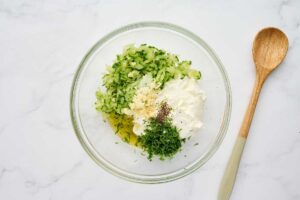 Tzatziki sauce for Greek chicken bowls made with yogurt, cucumber, dill, and garlic.