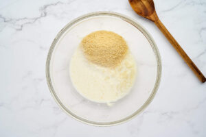 Finely grated onion and juices for Greek chicken meatballs.