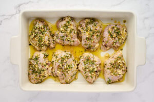 Whisked lemon herb marinade for Greek chicken.