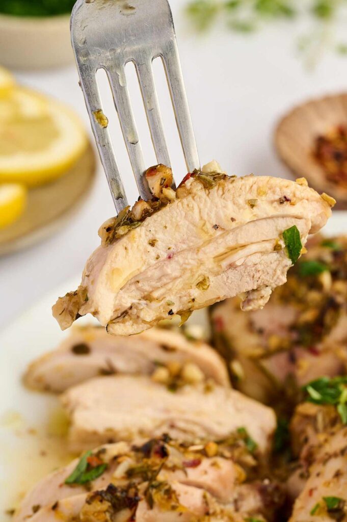 Baked Greek chicken thighs finished with parsley and lemony pan juices.