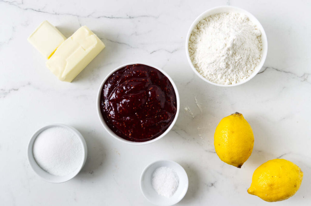Crumb mixture for raspberry shortbread bars with lemon zest and butter.