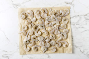 Orzo pasta toasted in olive oil for shrimp orzo recipe.