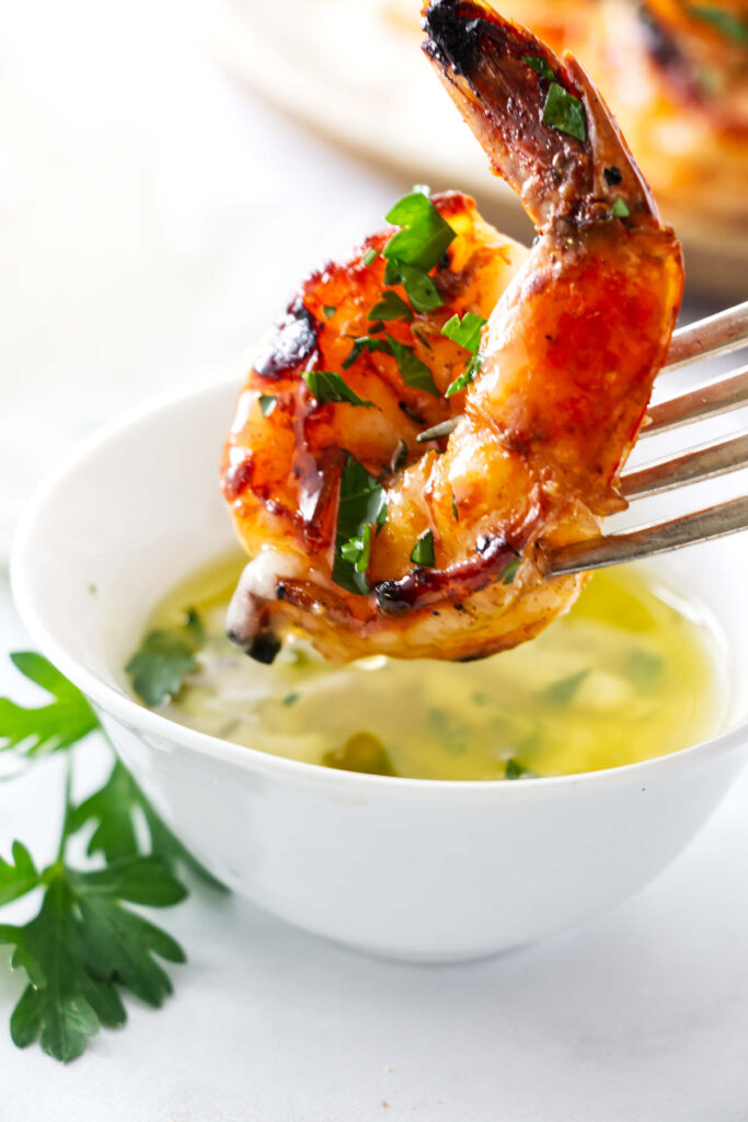 Charred grilled shrimp dipped into lemon butter sauce.
