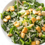 Caesar salad with romaine lettuce, croutons, and shaved parmesan cheese.