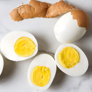 Peeled and sliced hard-boiled eggs.